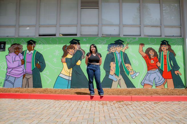 Giselle Lacap in front of Becoming Mural